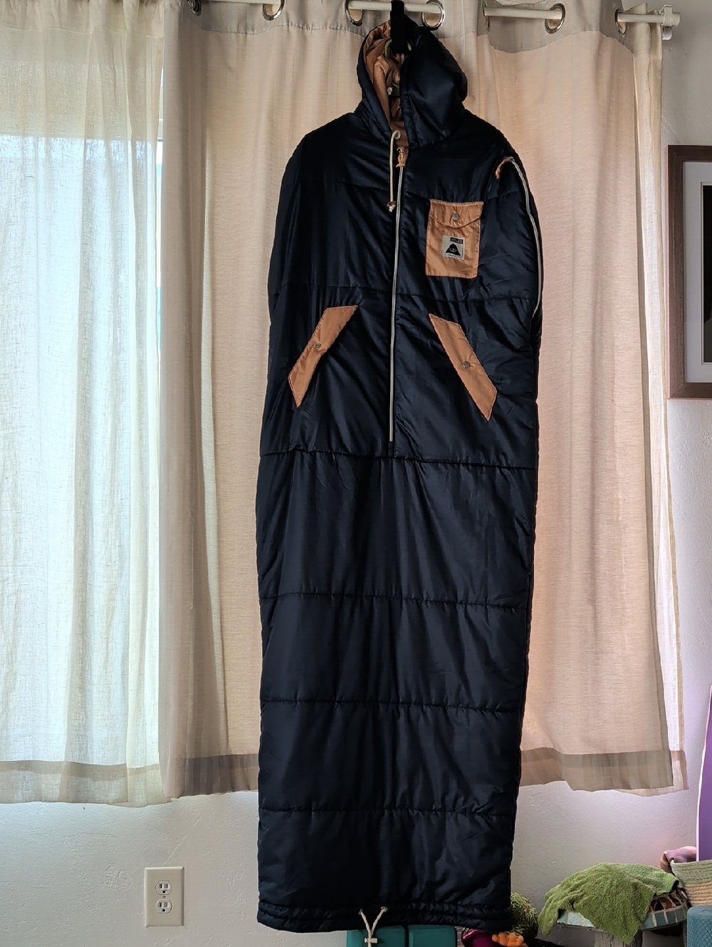 Poler Black Jacket with Tan Lining and Patch